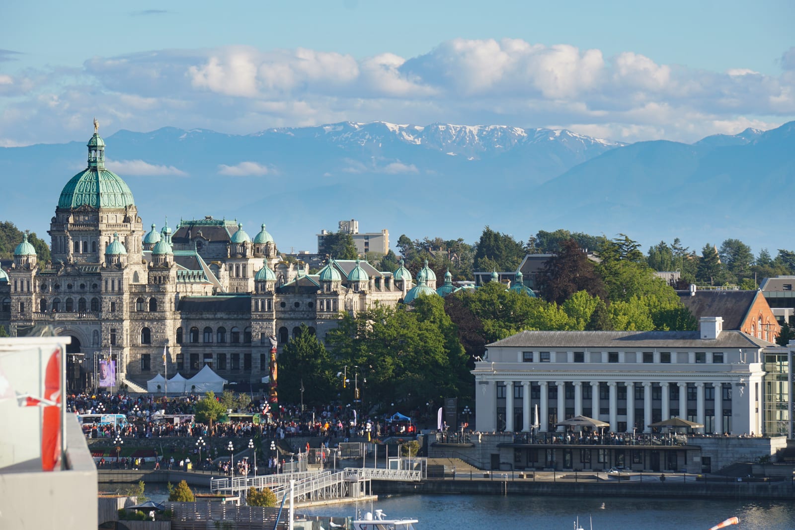 British Columbia Parliament Buildings with snow-capped mountains behind